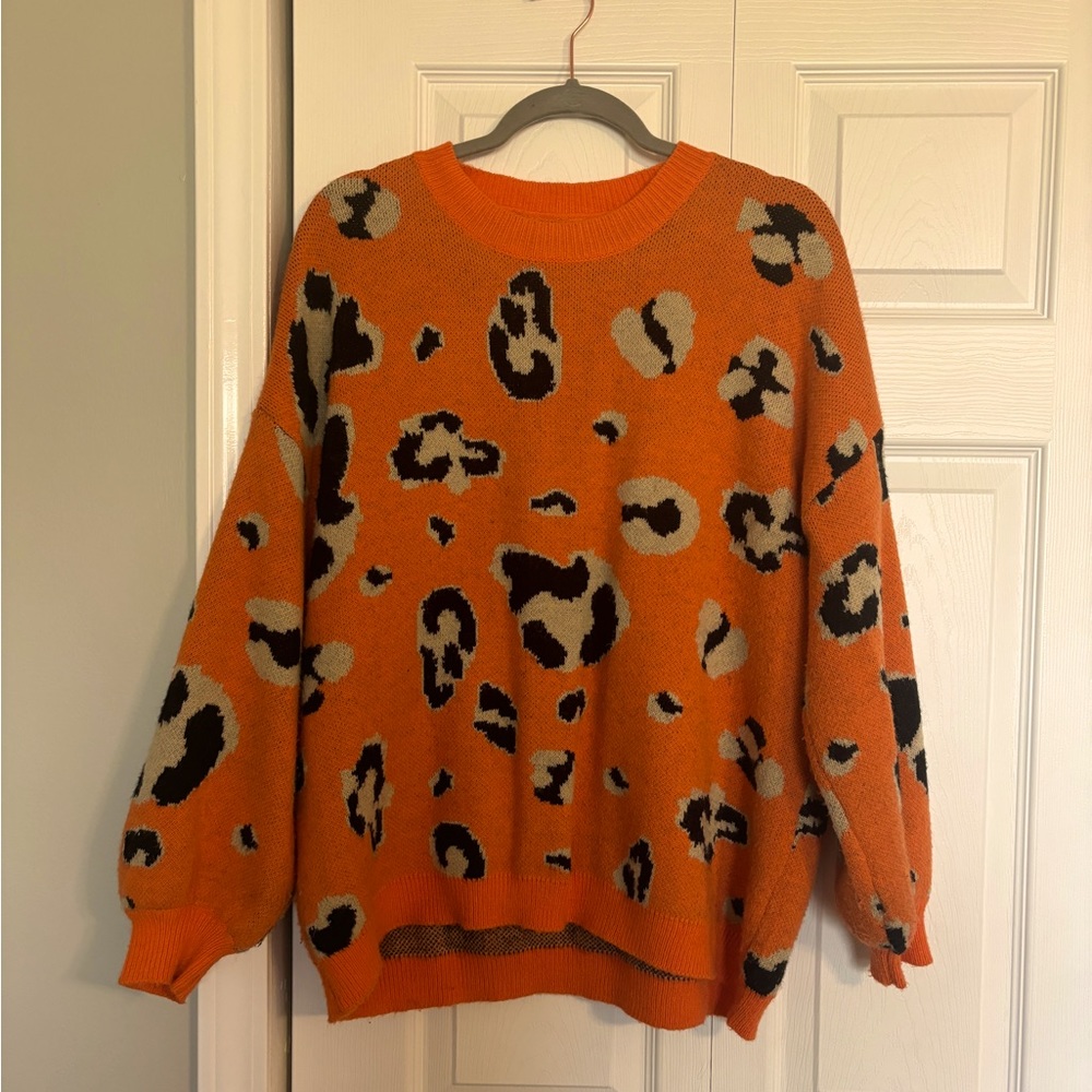 Orange leopard print sweater